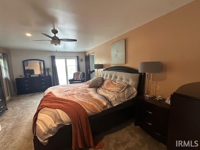 32131 State Road 2nd Rd, New Carlisle, IN 46552 - carpeted bedroom with a ceiling fan