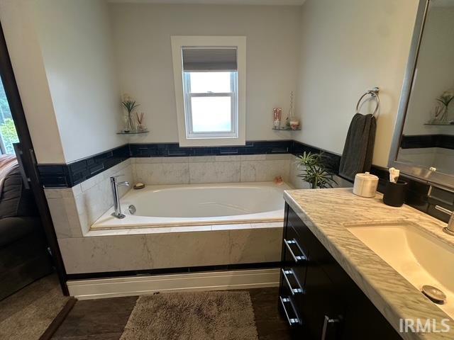 32131 State Road 2nd Rd, New Carlisle, IN 46552 - bathroom with vanity and a bath