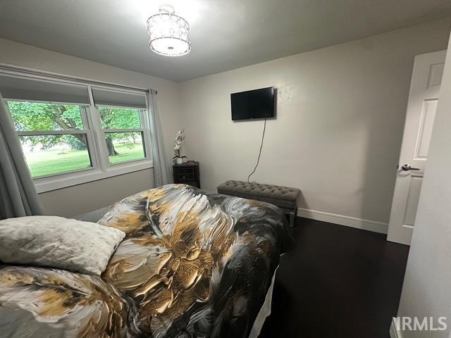 32131 State Road 2nd Rd, New Carlisle, IN 46552 - bedroom with baseboards and dark wood finished floors