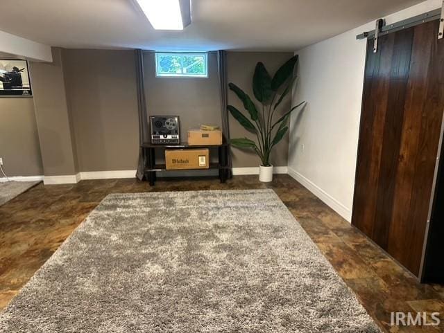 32131 State Road 2nd Rd, New Carlisle, IN 46552 - basement with a barn door and baseboards