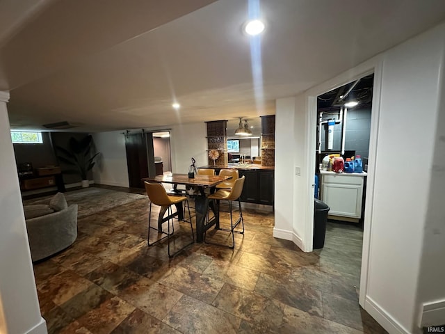32131 State Road 2nd Rd, New Carlisle, IN 46552 - dining area with dark stone finish floors and bar