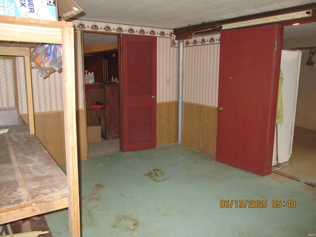 8487 N Old Highway 231st Rd, Linden, IN 47955 - basement featuring wallpapered walls, a wainscoted wall, wood walls, and carpet flooring