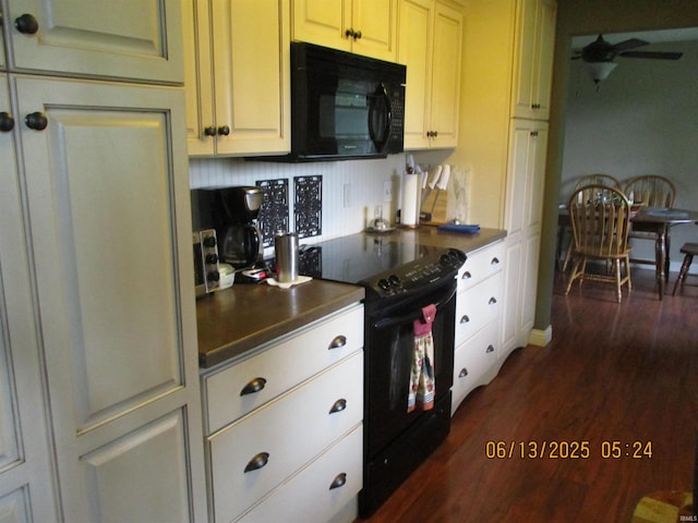 8487 N Old Highway 231st Rd, Linden, IN 47955 - kitchen featuring black appliances, a ceiling fan, dark wood finished floors, and dark countertops