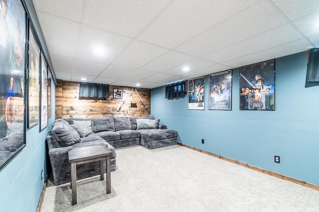 1703 Frantz Dr, North Manchester, IN 46962 - carpeted living room with wood walls, a paneled ceiling, and recessed lighting