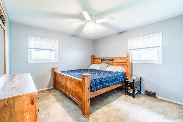1703 Frantz Dr, North Manchester, IN 46962 - bedroom with light carpet and ceiling fan