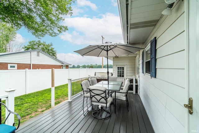 1703 Frantz Dr, North Manchester, IN 46962 - wooden terrace with outdoor dining space and a water view