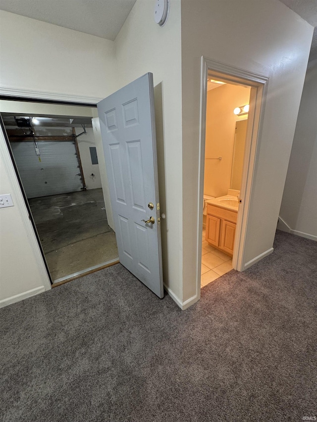 3832 E Cobble Creek Dr, Bloomington, IN 47401 - hallway featuring carpet and baseboards