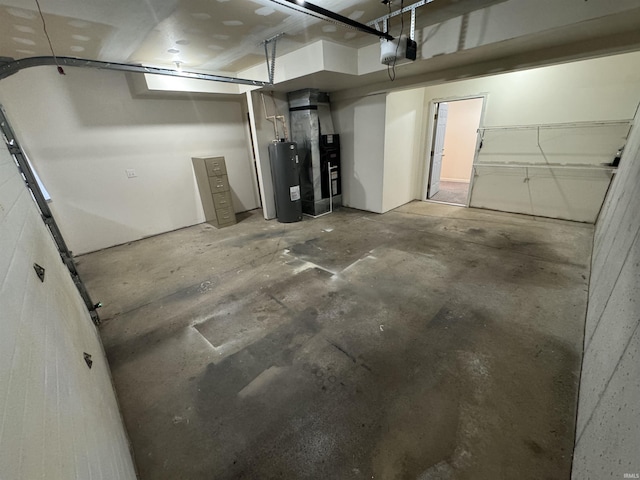 3832 E Cobble Creek Dr, Bloomington, IN 47401 - garage featuring water heater, a garage door opener, and heating unit