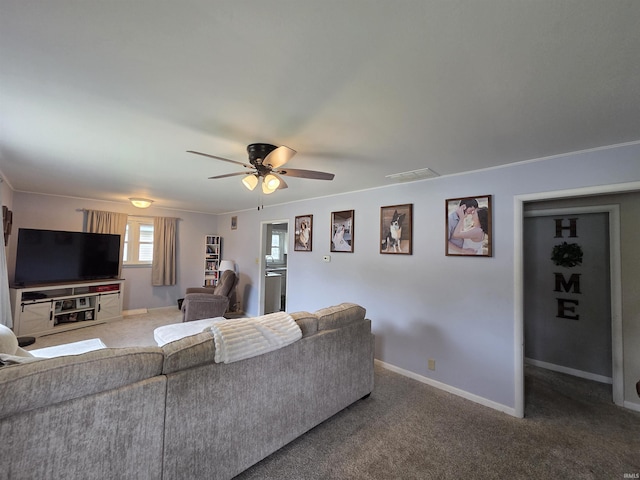 603 E 1st St, Fowler, IN 47944 - living room featuring a ceiling fan and carpet flooring