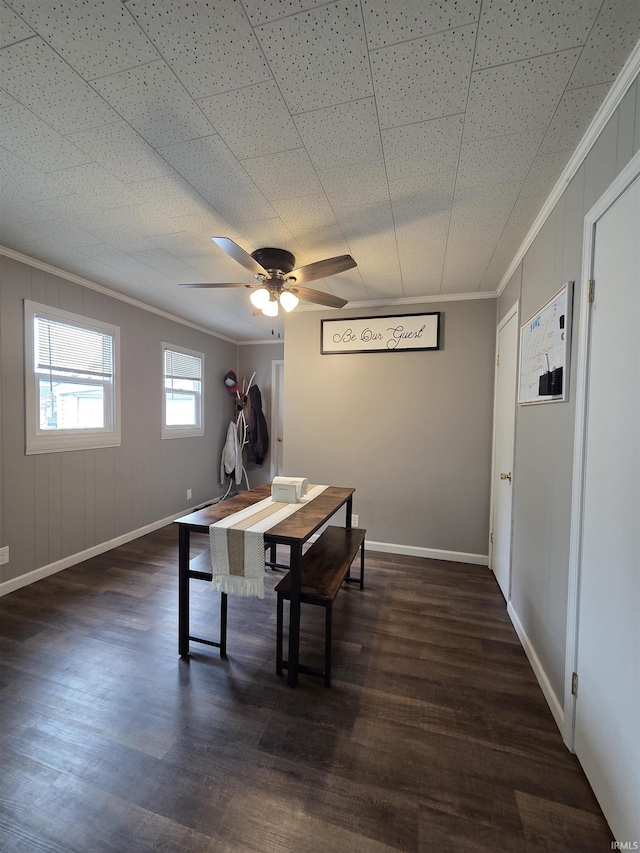 603 E 1st St, Fowler, IN 47944 - dining room with ornamental molding, dark wood-type flooring, and a ceiling fan