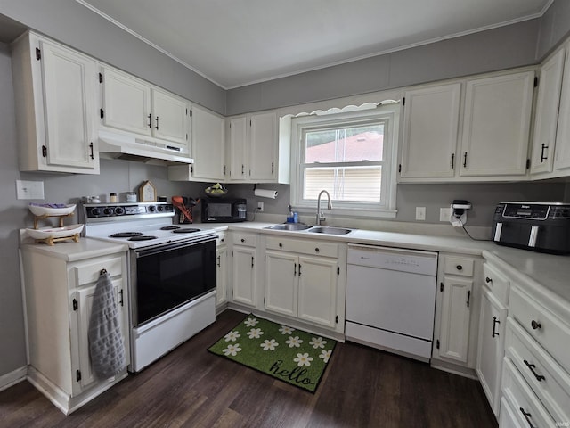 603 E 1st St, Fowler, IN 47944 - kitchen with white appliances, under cabinet range hood, dark wood-type flooring, crown molding, and white cabinets