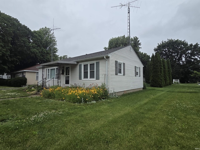 603 E 1st St, Fowler, IN 47944 - view of front of house featuring a front yard