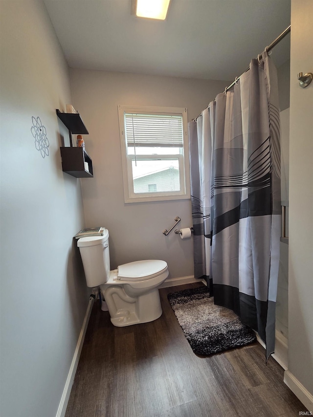 603 E 1st St, Fowler, IN 47944 - full bathroom with wood finished floors and a shower with curtain