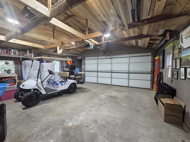 603 E 1st St, Fowler, IN 47944 - garage featuring a garage door opener