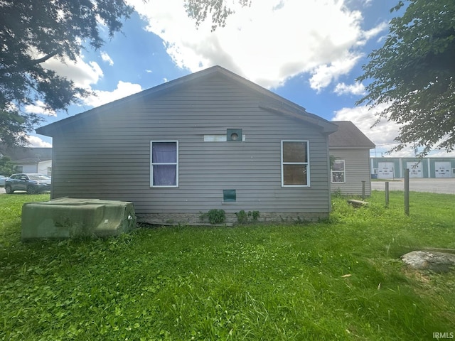 126 Cook St, Jasonville, IN 47438 - view of home's exterior with a yard