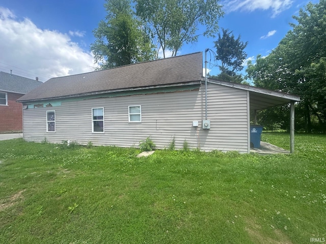 126 Cook St, Jasonville, IN 47438 - view of property exterior with a lawn and roof with shingles