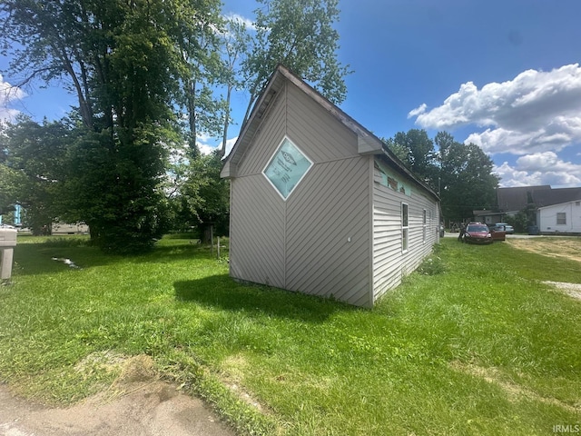 126 Cook St, Jasonville, IN 47438 - view of property exterior with a yard