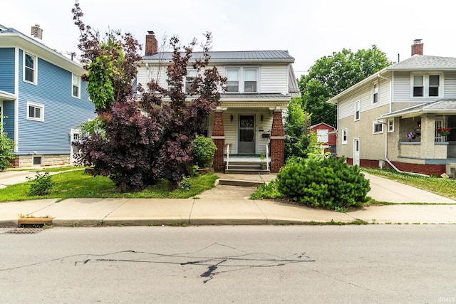 2130 N Wells St, Fort Wayne, IN 46808 - view of front of home with brick siding and a chimney