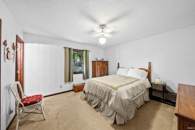 55698 Willowbend Blvd, Bristol, IN 46507 - bedroom with light carpet, a textured ceiling, and ceiling fan