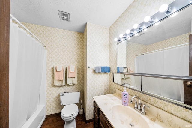 55698 Willowbend Blvd, Bristol, IN 46507 - bathroom with wood finished floors, vanity, wallpapered walls, shower / bathtub combination with curtain, and a textured ceiling