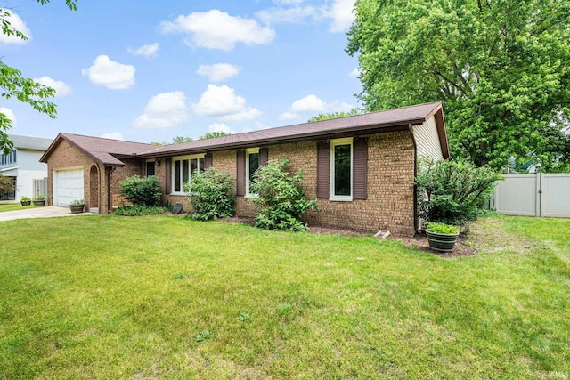55698 Willowbend Blvd, Bristol, IN 46507 - single story home featuring brick siding, driveway, a garage, and a gate