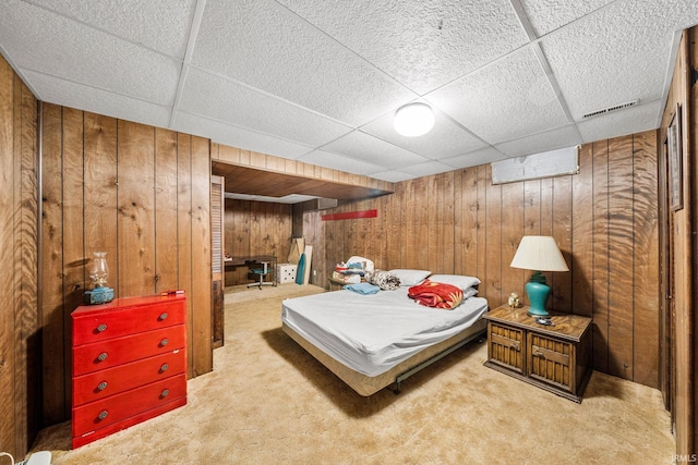 55698 Willowbend Blvd, Bristol, IN 46507 - bedroom with a paneled ceiling, wood walls, and carpet floors