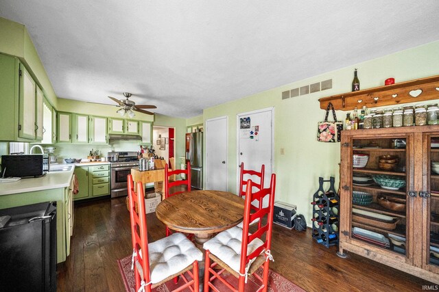 55698 Willowbend Blvd, Bristol, IN 46507 - dining area featuring dark wood-style floors and a ceiling fan