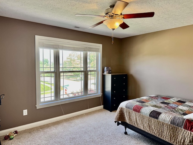3638 Swansea Dr, West Lafayette, IN 47906 - bedroom featuring light carpet, a textured ceiling, and a ceiling fan