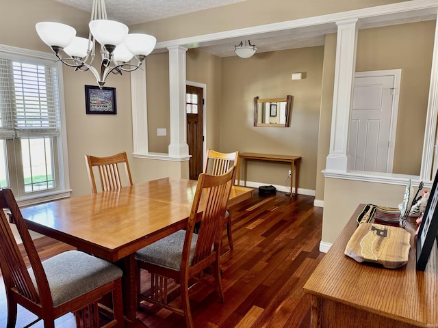 3638 Swansea Dr, West Lafayette, IN 47906 - dining space with decorative columns, dark wood-style floors, and plenty of natural light