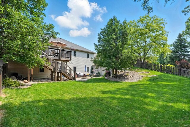 5432 Argiano Xing, Fort Wayne, IN 46845 - fenced yard featuring stairway and a wooden deck