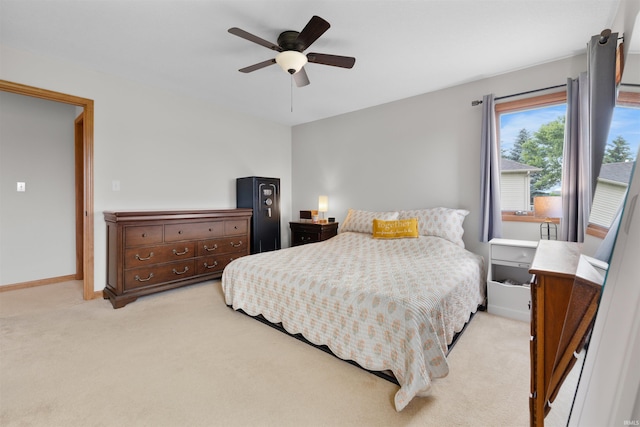 5371 Bear Creek Pass, Auburn, IN 46706 - bedroom with light carpet and ceiling fan