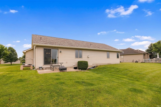 5371 Bear Creek Pass, Auburn, IN 46706 - rear view of house featuring a patio area and a lawn