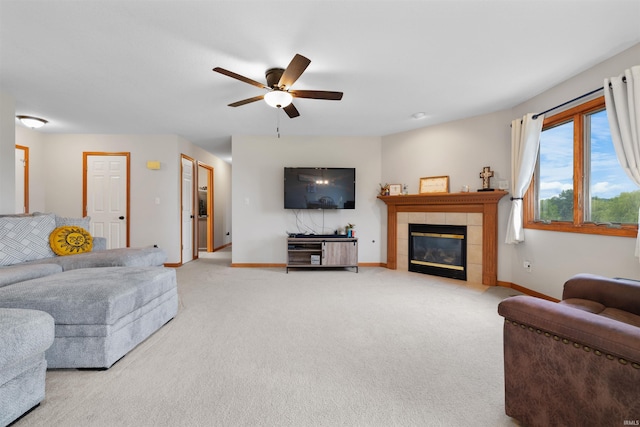 5371 Bear Creek Pass, Auburn, IN 46706 - carpeted living room featuring a ceiling fan and a fireplace