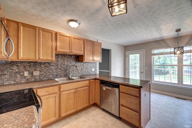 4539 N Shadow Wood Dr, Bloomington, IN 47404 - kitchen with appliances with stainless steel finishes, a peninsula, tasteful backsplash, dark countertops, and a textured ceiling