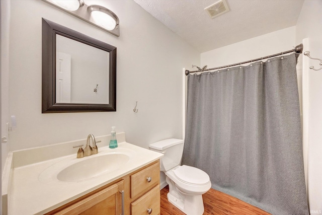 4539 N Shadow Wood Dr, Bloomington, IN 47404 - full bath with vanity, wood finished floors, and a shower with curtain