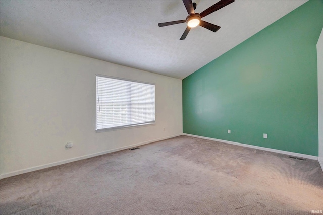 4539 N Shadow Wood Dr, Bloomington, IN 47404 - unfurnished room with a ceiling fan, carpet floors, and lofted ceiling
