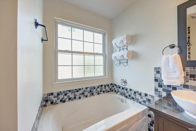 4539 N Shadow Wood Dr, Bloomington, IN 47404 - full bath featuring a bath, vanity, and tasteful backsplash