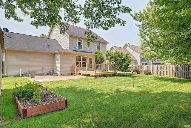 4539 N Shadow Wood Dr, Bloomington, IN 47404 - rear view of house featuring a garden, a deck, and a patio