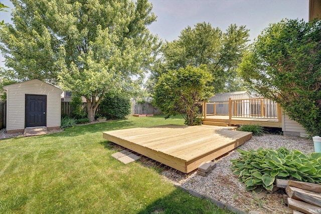 4539 N Shadow Wood Dr, Bloomington, IN 47404 - fenced backyard with a shed and a wooden deck