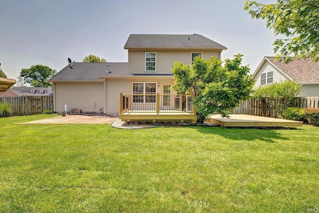 4539 N Shadow Wood Dr, Bloomington, IN 47404 - rear view of property with a fenced backyard, a patio, and a wooden deck