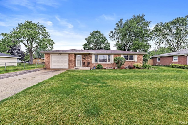 2514 Wood St, Elkhart, IN 46514 - ranch-style home with a garage, driveway, and brick siding