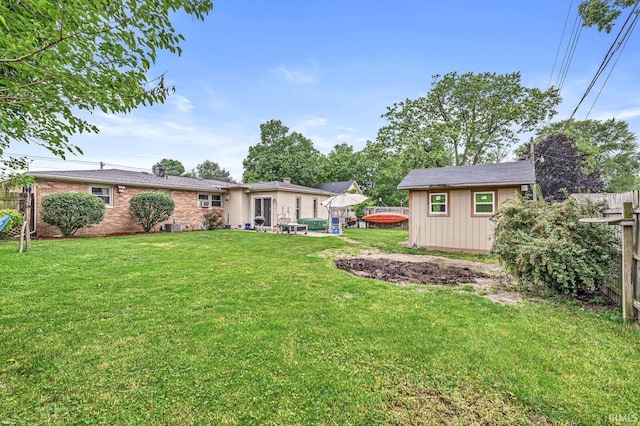 2514 Wood St, Elkhart, IN 46514 - view of yard featuring a storage unit