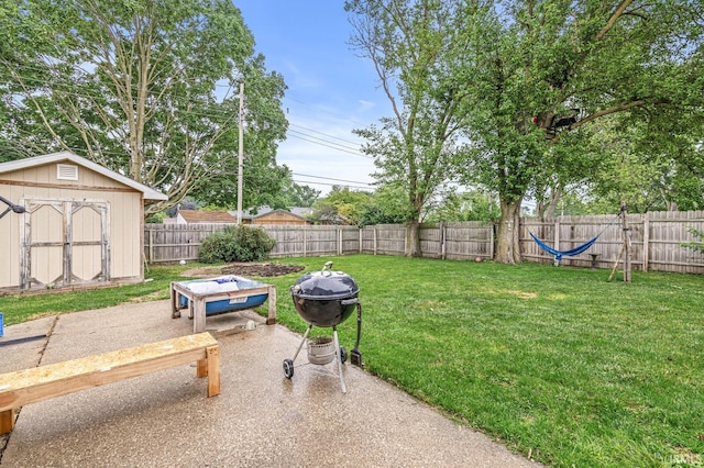 2514 Wood St, Elkhart, IN 46514 - fenced backyard with a patio and a storage shed