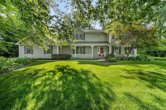 17112 Ridgefield Ct, Granger, IN 46530 - traditional home featuring a front lawn and a porch
