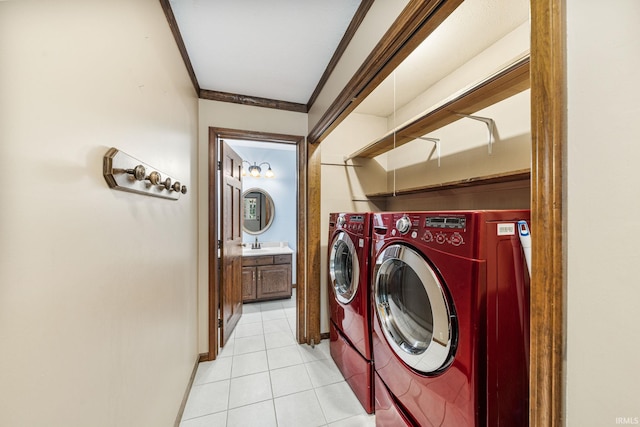17112 Ridgefield Ct, Granger, IN 46530 - washroom with light tile patterned floors, washer and clothes dryer, and ornamental molding
