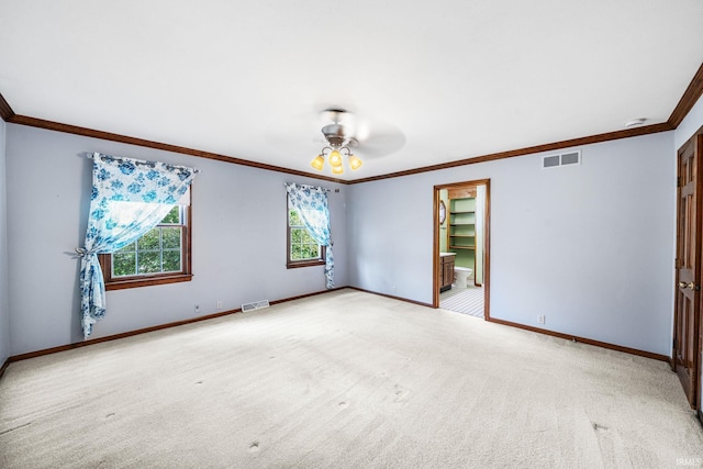 17112 Ridgefield Ct, Granger, IN 46530 - unfurnished room featuring ornamental molding, light colored carpet, ceiling fan, and a smoke detector