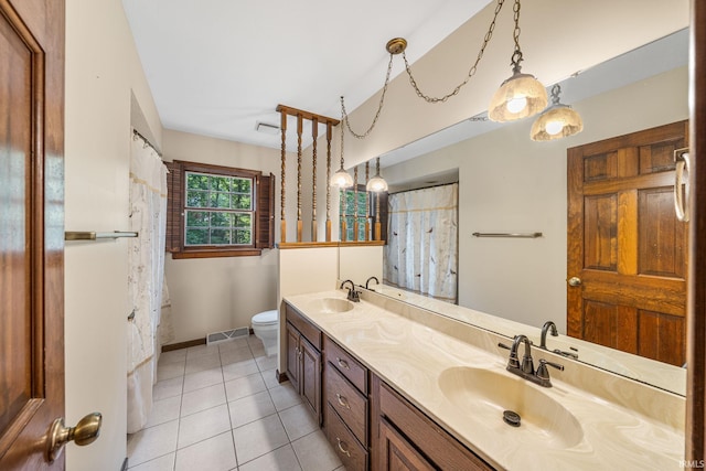 17112 Ridgefield Ct, Granger, IN 46530 - bathroom with double vanity and tile patterned flooring