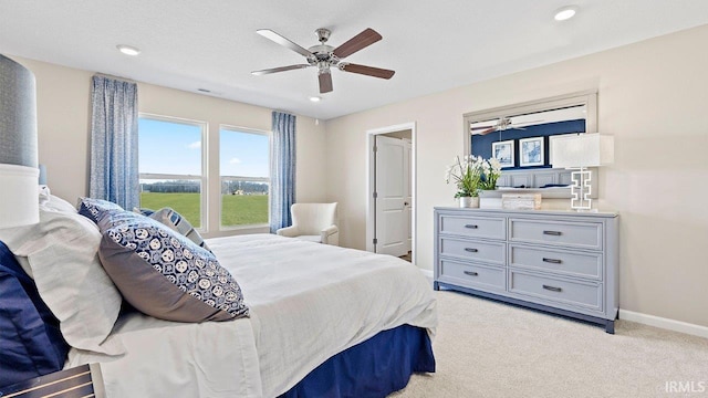 12967 Solo Ln, Fort Wayne, IN 46818 - bedroom featuring light colored carpet, a ceiling fan, and recessed lighting