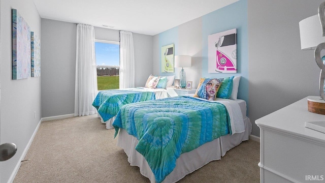 12967 Solo Ln, Fort Wayne, IN 46818 - bedroom featuring light colored carpet and baseboards