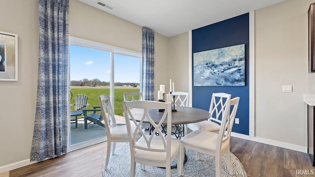 12967 Solo Ln, Fort Wayne, IN 46818 - dining room featuring wood finished floors and baseboards